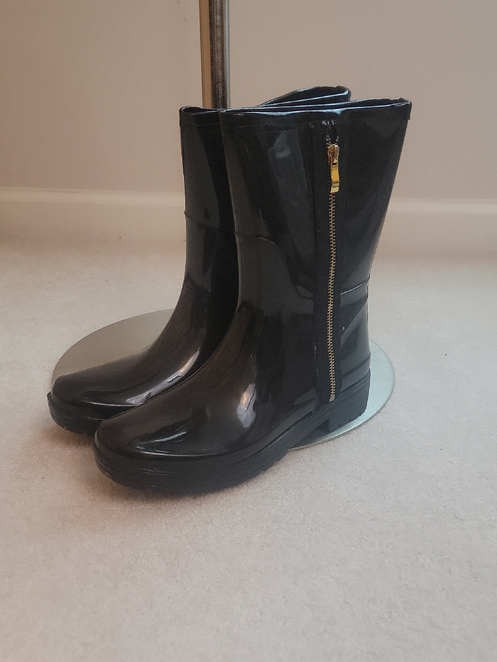 Black rain boots by Unlisted